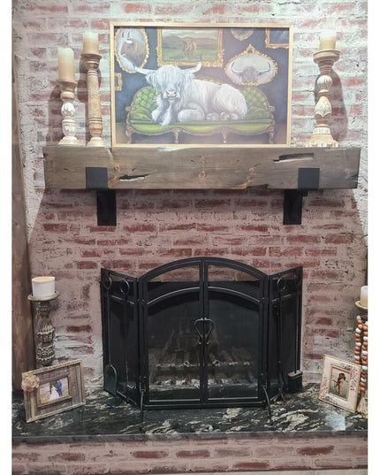 Heavy duty black steel mantel brackets supporting rustic wooden beam mantel shelf above brick fireplace, Industrial Farm C...