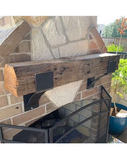 Kudlick Farmhouse Mantel Bracket by Industrial Farm Co - rustic wood beam mantel with black metal brackets mounted on ston...