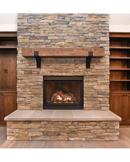 Kudlick black metal farmhouse mantel brackets supporting wooden beam above stone fireplace with built-in shelving by Indus...