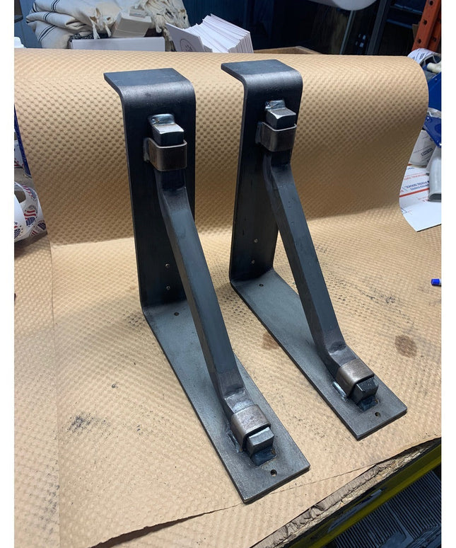 Black steel mantel brackets with square support bars and metal straps by Industrial Farm Co, handmade heavy duty construct...
