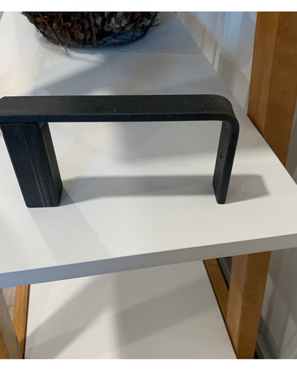 Black metal Hal Standing Mounted Blanket Ladder by Industrial Farm Co displayed on white shelf with wooden legs