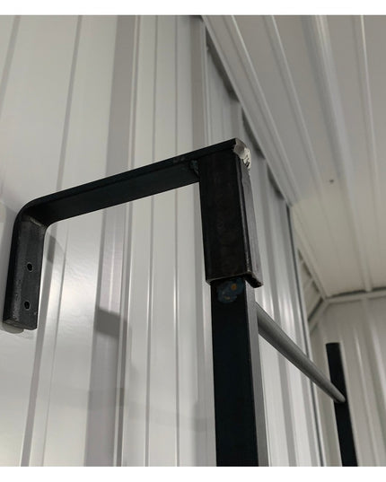 Black metal Hal Standing Mounted Blanket Ladder by Industrial Farm Co showing wall-mounted bracket and vertical rail again...