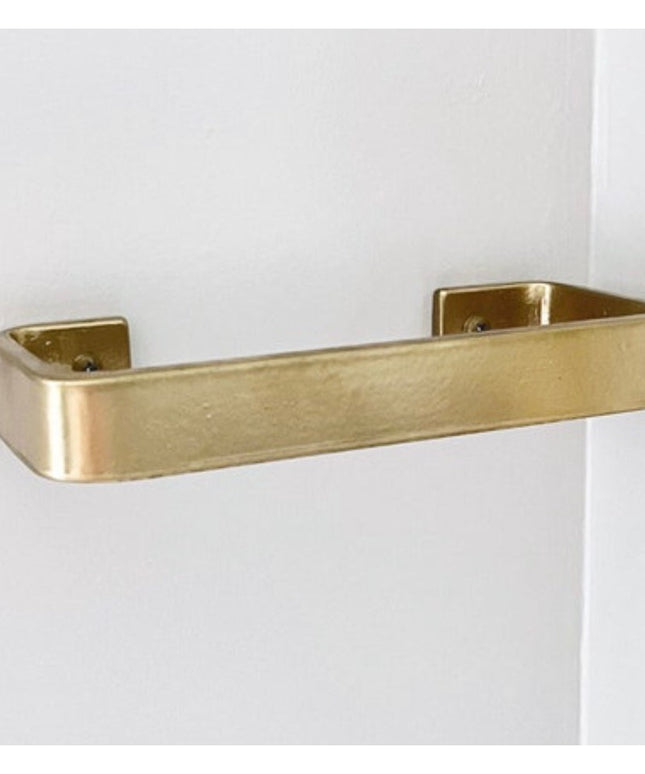 Industrial Farm Co Emma Towel Holder in brushed gold brass finish mounted on white wall, modern rectangular door pull design