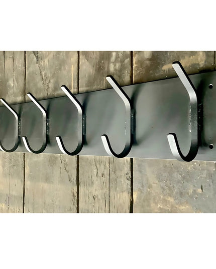 Bo Style Lodge Coat Rack by Industrial Farm Co featuring black metal hooks on weathered wood fence background