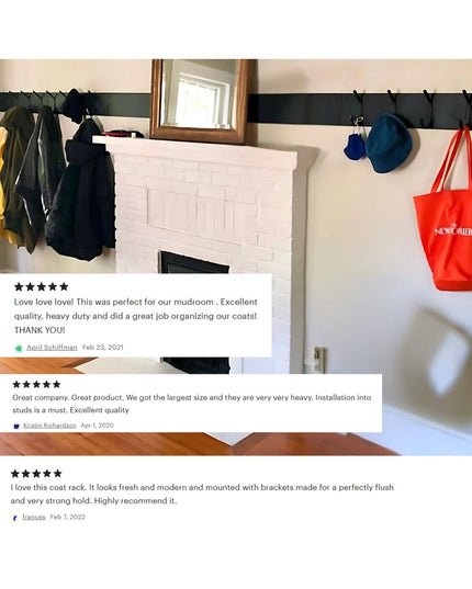 White painted wood Bo Style Lodge Coat Rack by Industrial Farm Co mounted on mudroom wall with black metal hooks holding c...