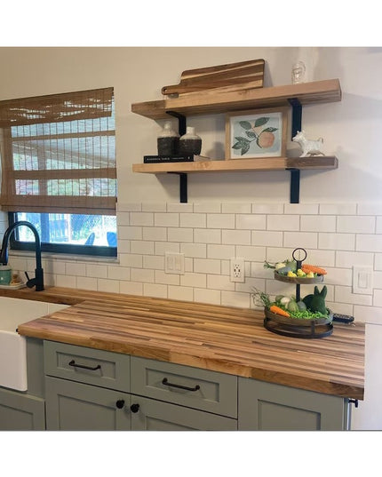 Black metal L-shaped shelf brackets supporting natural wood floating shelves in modern farmhouse kitchen with subway tile ...