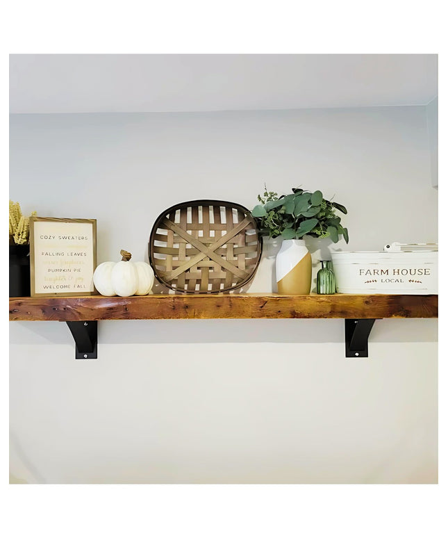 Heavy duty black steel industrial shelf brackets supporting rustic wood floating shelf with farmhouse decor - Industrial F...