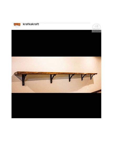 Rustic wood wall shelf with black metal Butch Shelf Supports by Industrial Farm Co mounted on white wall