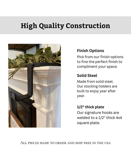 Black steel Annie Stocking Holder by Industrial Farm Co mounted on white mantel with greenery, showing solid construction ...