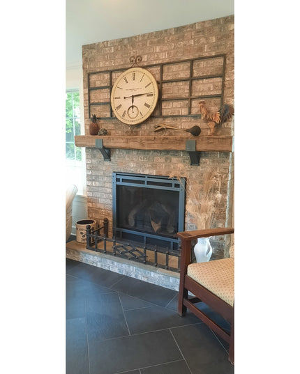 Rustic Norfolk Farmhouse Brackets by Industrial Farm Co supporting wooden mantel above brick fireplace in farmhouse living...