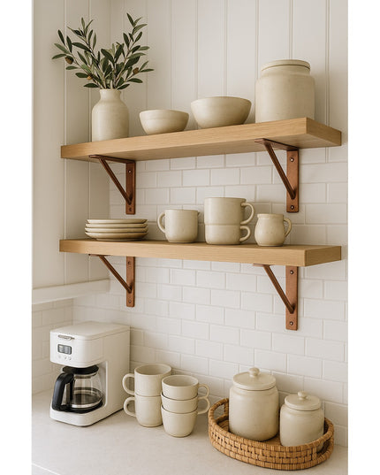 Middletown L Shelf Support brackets in copper finish holding natural wood shelves with beige ceramic dishes and mugs in mo...