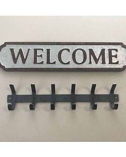 Rustic metal welcome sign with 6 black coat hooks mounted on white wall - The Christopher Double Hook Coat Rack by Industr...