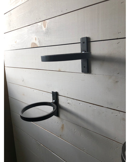 Black metal Smoral Handmade Pot Holder with circular ring and shelf bracket mounted on white shiplap wall by Industrial Fa...