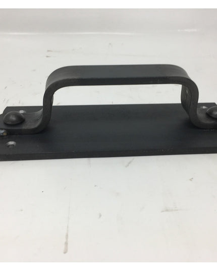 Black metal Corning Handle door pull with rectangular base plate and curved grip handle by Industrial Farm Co on white bac...