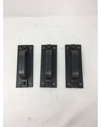 Three black metal Corning Handle door pulls by Industrial Farm Co arranged vertically on white background, featuring recta...