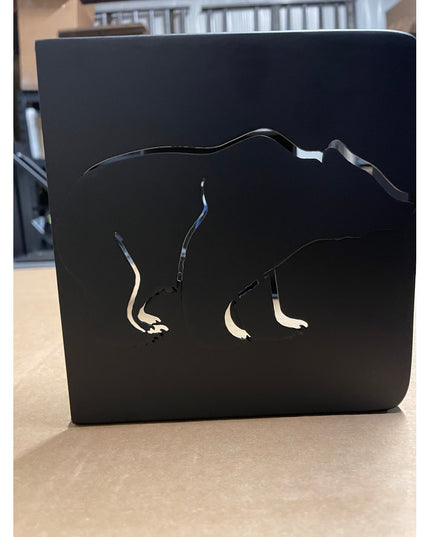 Black metal Vandiver Bear Mantel End Cap with cut-out bear silhouette design by Industrial Farm Co displayed on wooden sur...