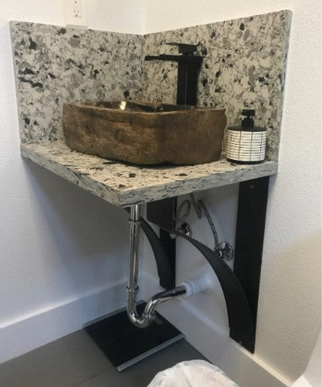 Black metal Endicott Breakfast Bar Support bracket holding granite corner sink vanity with vessel bowl and modern faucet