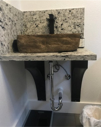 Rustic wooden vessel sink basin with natural stone backsplash and black metal bracket supports from Industrial Farm Co