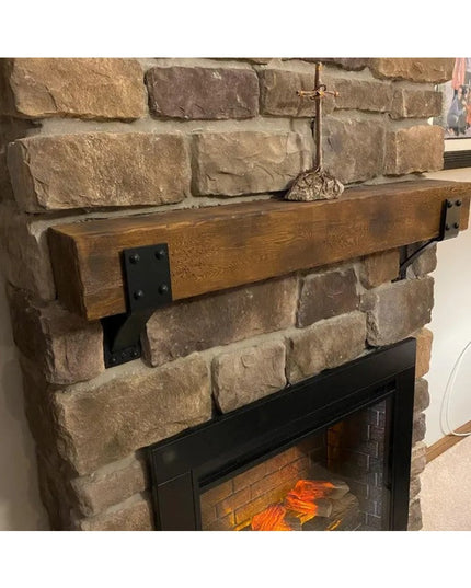 Heavy duty steel Spafford mantel brackets with rivets supporting rustic wood beam on stone fireplace, handmade by Industri...