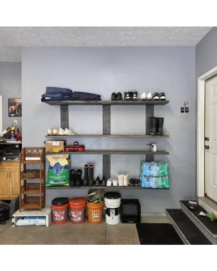 Heavy duty steel shelf brackets supporting floating shelves in garage storage area with shoes, clothes, and supplies organ...