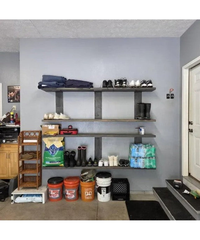 Heavy duty steel shelf brackets supporting floating shelves in garage storage area with shoes, clothes, and supplies organ...