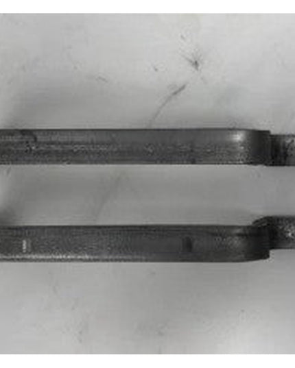 Two black metal Onondaga door handles by Industrial Farm Co shown on white background, featuring rustic industrial design ...