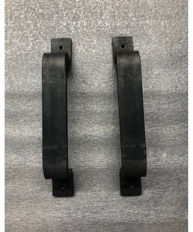 Two black metal Sagamore Hill Pull door handles by Industrial Farm Co displayed on textured gray surface, showing modern i...