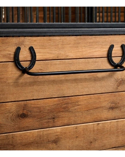 Black metal horseshoe towel bar mounted on wooden stable wall - The Donahue Horseshoe Blanket & Towel Bar by Industrial Fa...