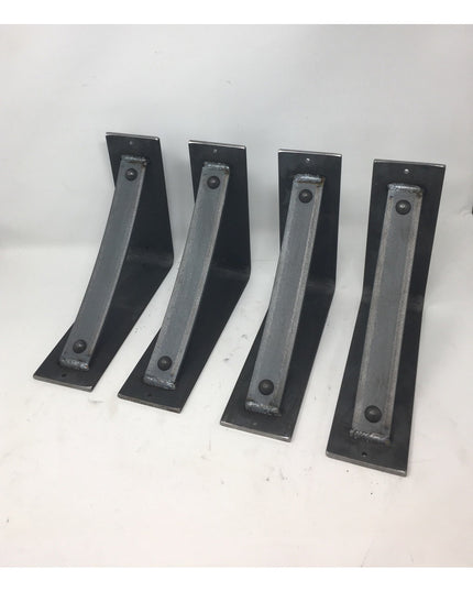 Four black metal Troy Shelf Support brackets by Industrial Farm Co with welded reinforcement bars and mounting holes displ...
