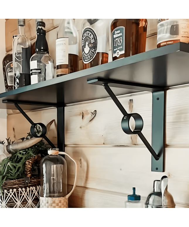 Black brackets holding wooden shelf