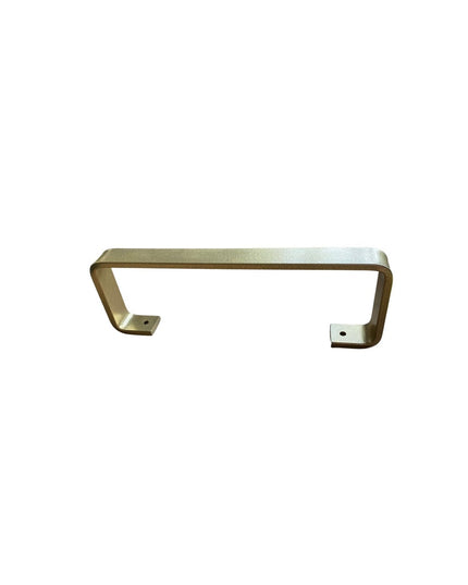 Brass-finished Emma Towel Holder door pull by Industrial Farm Co featuring modern curved design with mounting holes on whi...