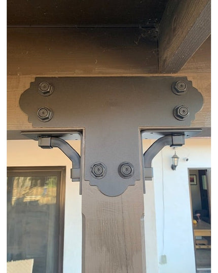 Hornell Industrial Shelf Support by Industrial Farm Co mounted on wooden beam, showing gray metal bracket with decorative ...