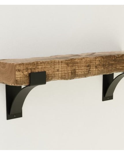 Kudlick Farmhouse wooden mantel shelf with black metal brackets mounted on white wall by Industrial Farm Co
