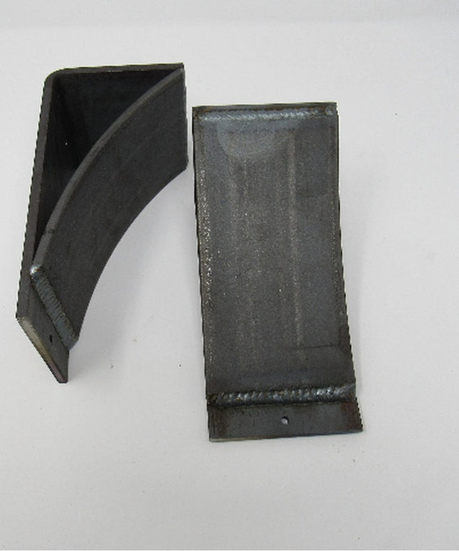 Black metal Tipp Hill Mantel Support brackets by Industrial Farm Co, showing two L-shaped corbels with welded construction...