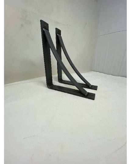 Black metal Rey Bracket Support shelf brackets by Industrial Farm Co, triangular industrial design with wall mounting tabs...