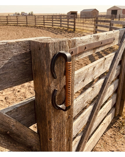 Bermuda Horseshoe door handle with leather wrap mounted on weathered wooden farm gate, handcrafted by Industrial Farm Co