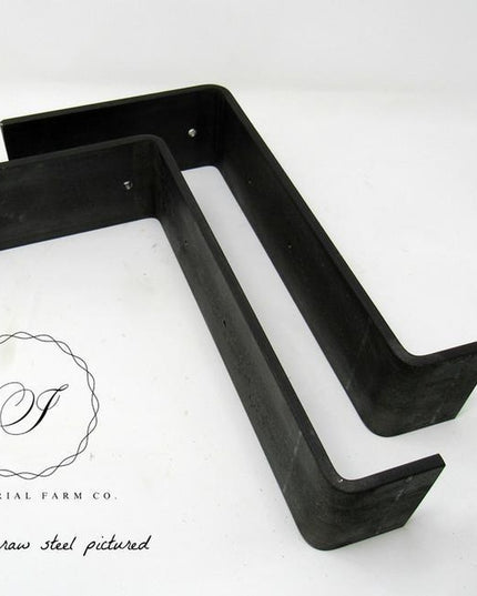Black raw steel L-shaped Cedarvale shelf supports by Industrial Farm Co, featuring 3-inch wide brackets with mounting hole...