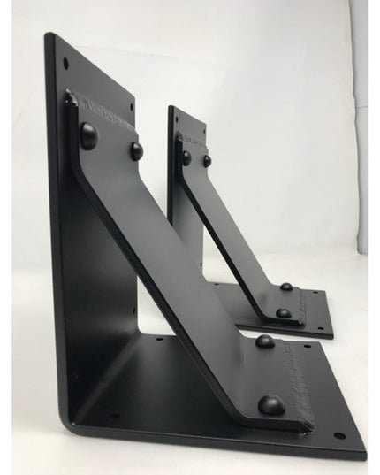 Black metal Parish Style Bracket Supports by Industrial Farm Co, two triangular wall-mounted shelf brackets with decorativ...