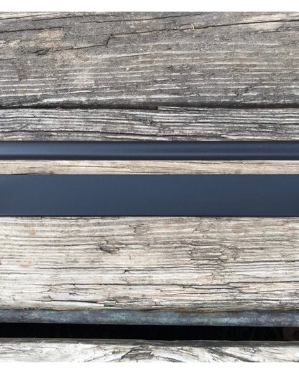 Oswego Modern Bathroom Towel Bar in matte black finish mounted on weathered wood background by Industrial Farm Co