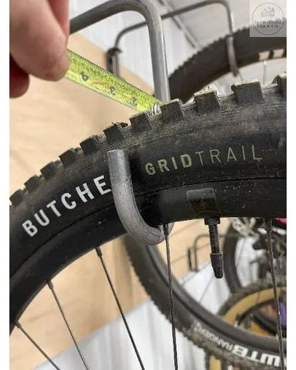 The Logan Wall Mounted Bike Rack Hook Fat Bike Rim Finish Black Powder Coat | Industrial Farm Co